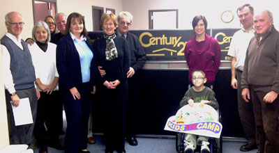 Picture of the Century 21 Moncton team, with Noah Folz the Ambassador of Easter Seals New Brunswick.