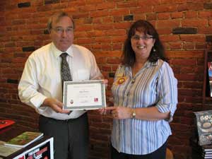 Glen Piercy receives Certificate of Appreciation for his contributions to the 2010 Easter Seals Paper Egg Campaign
